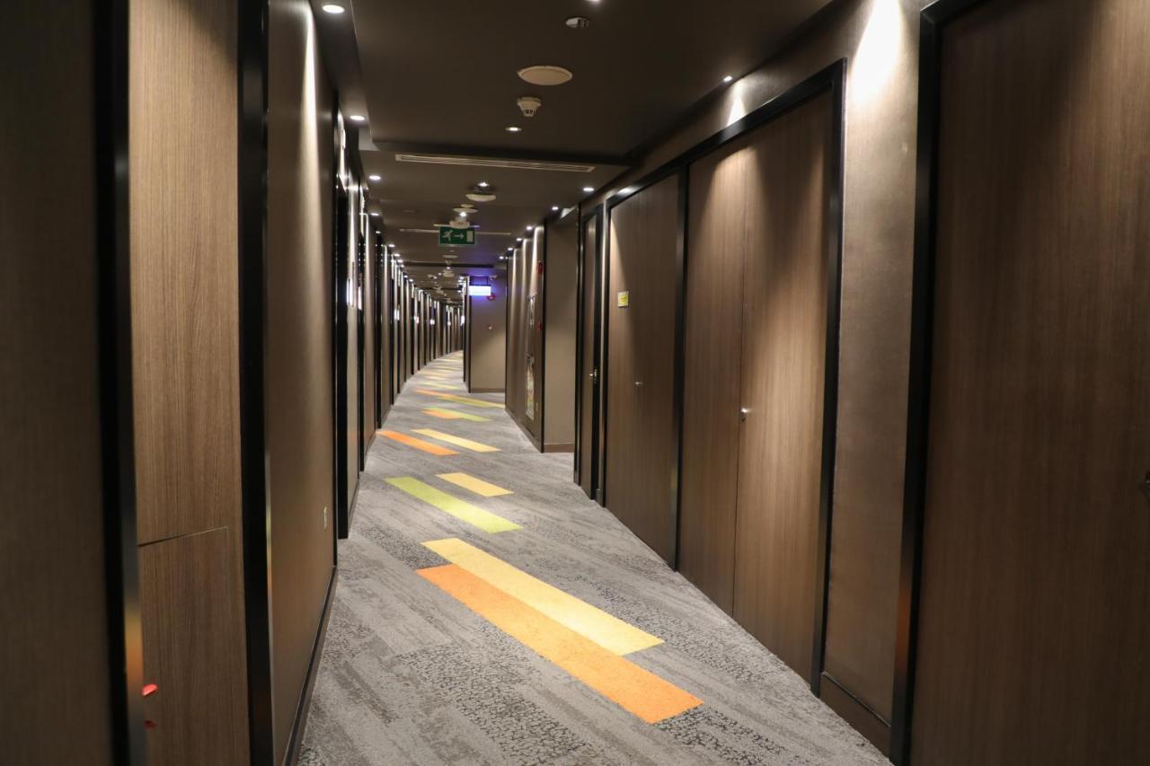 Abu Dhabi Airport Hotel T1 International Departures Eksteriør billede